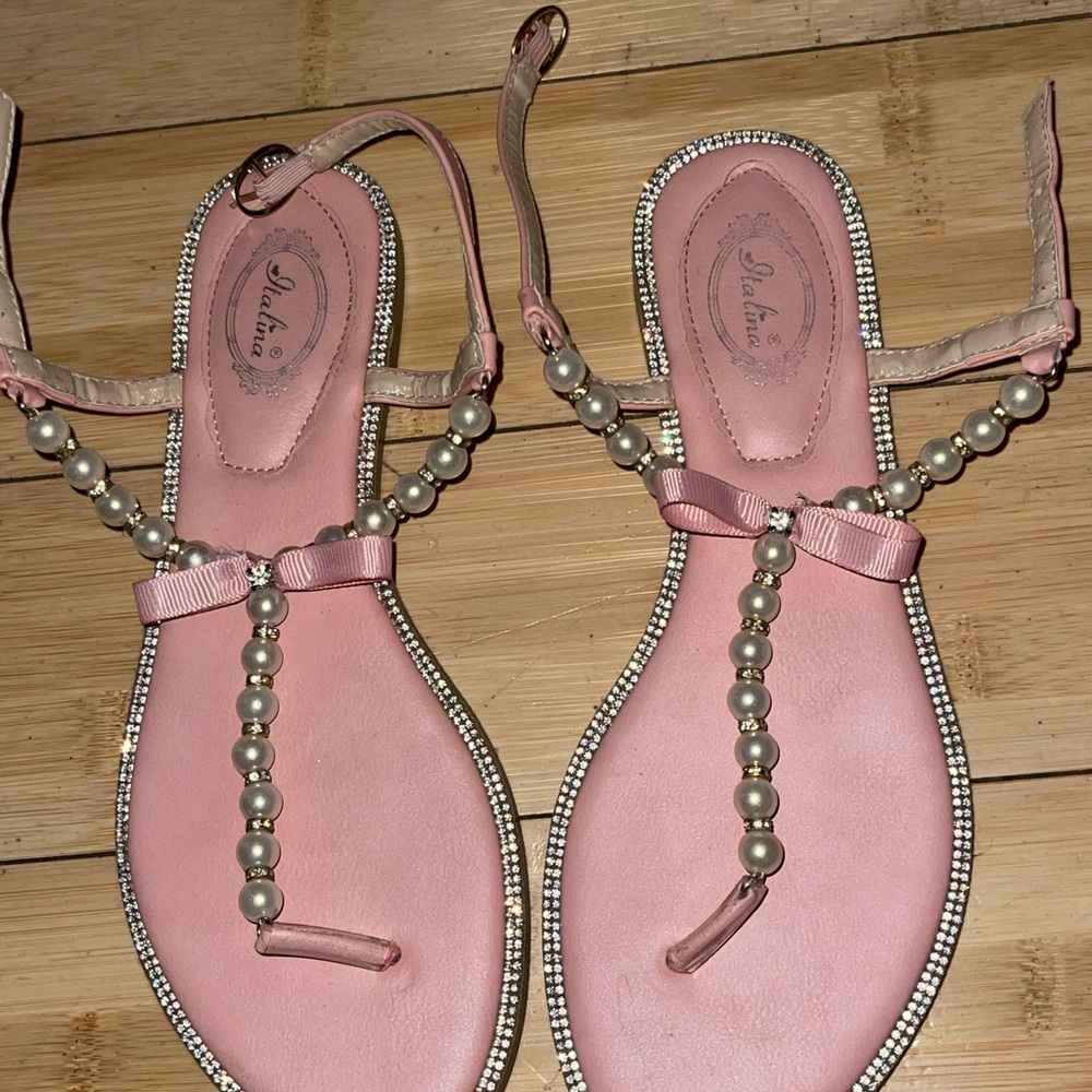Pink and Cream Flats with Metallic Straps and Decorative Accents